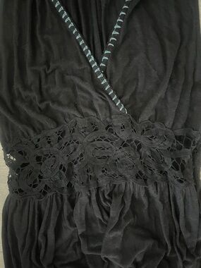 Free People size medium
Black Sleeveless Crochet Waist Blouse with Blue Trim